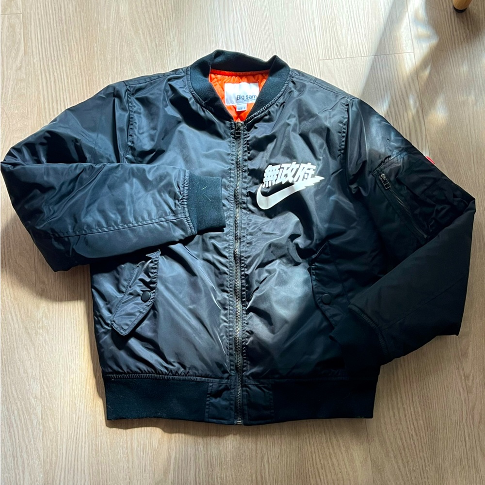 Nike/Big Sam Black Bomber Jacket with White Swoosh Graphic